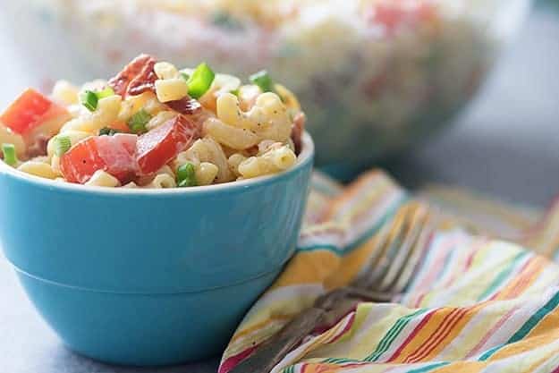 Pasta salad with mayo, bacon, tomatoes, and green onions! Perfect for summer.