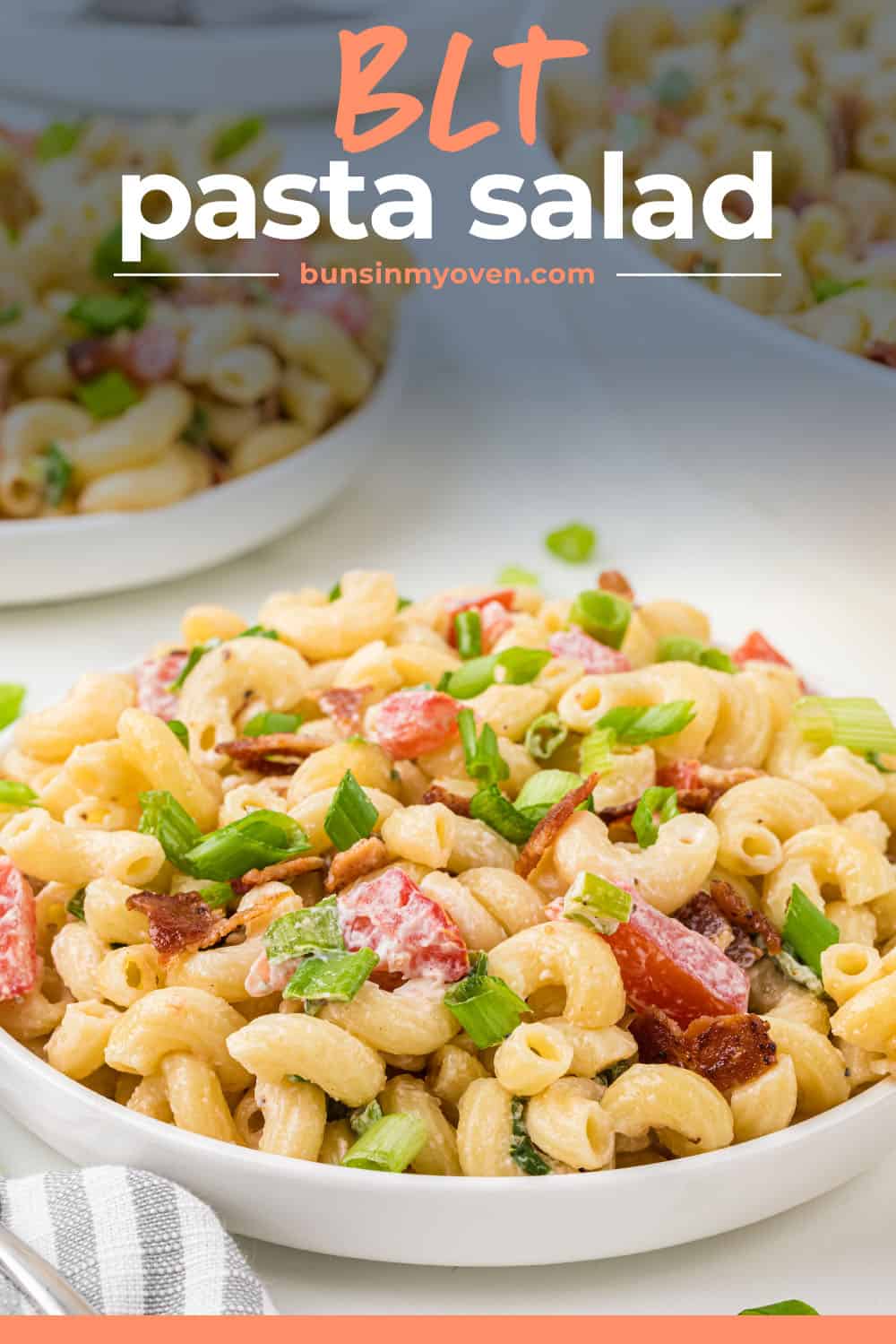 BLT pasta salad in small white bowl.