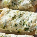 This garlic bread recipe will teach you how to make the best homemade garlic bread ever! It's creamy, cheesy, and full of flavor.