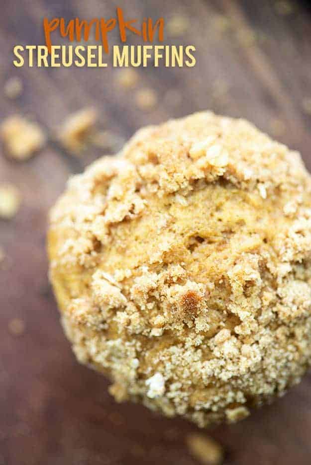 muffin with streusel crumbs on a cutting board