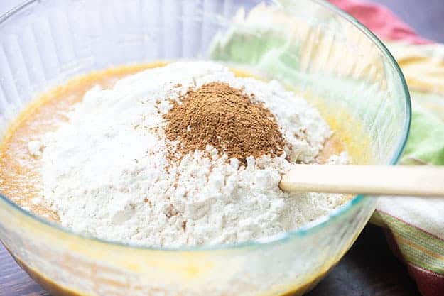 pumpkin muffin ingredients in glass bowl