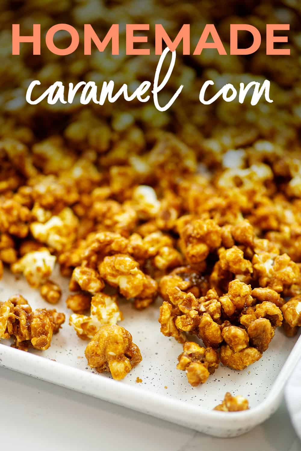 Homemade caramel corn on baking sheet.