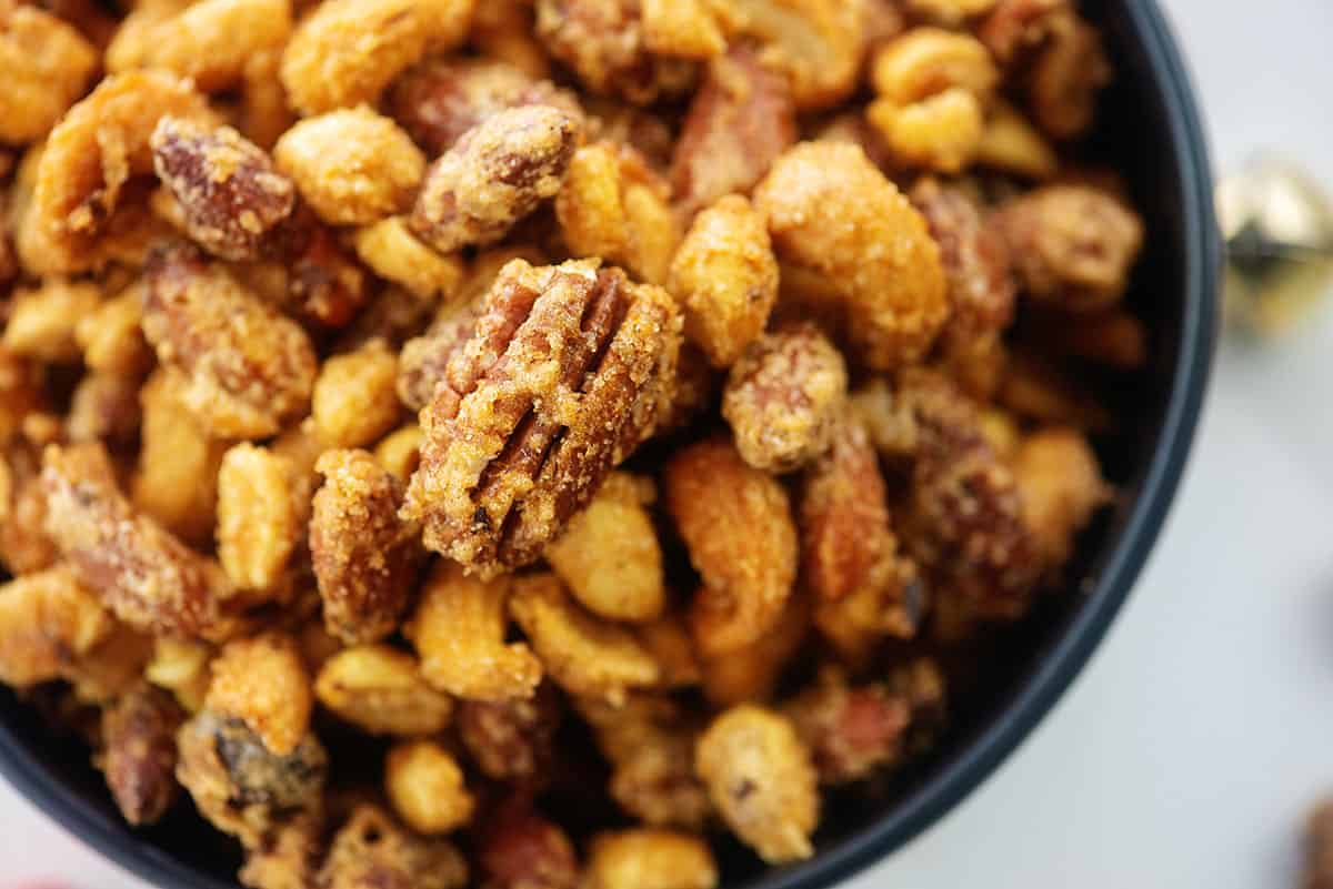 candied nuts in black bowl.