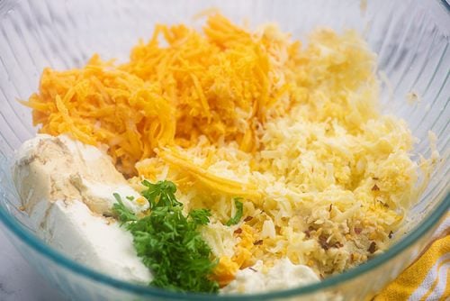 cream cheese spread ingredients in a glass bowl.