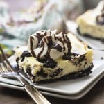 This Oreo cheesecake recipe has just a handful of ingredients! We love the Oreo cookie crust hiding under the creamy cheesecake!