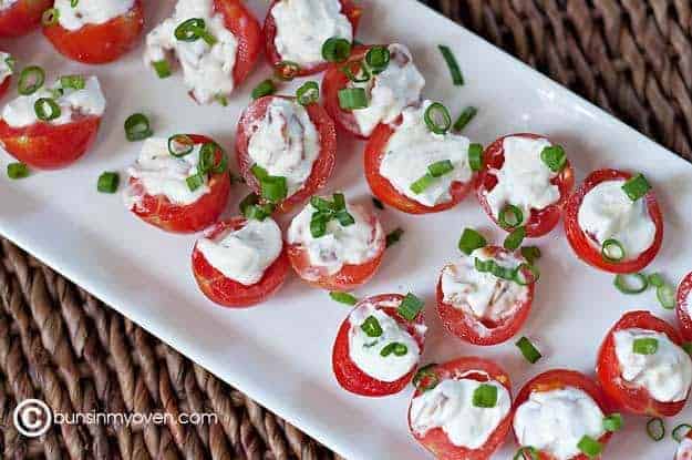 An appetizer tray full of BLT tomatoes