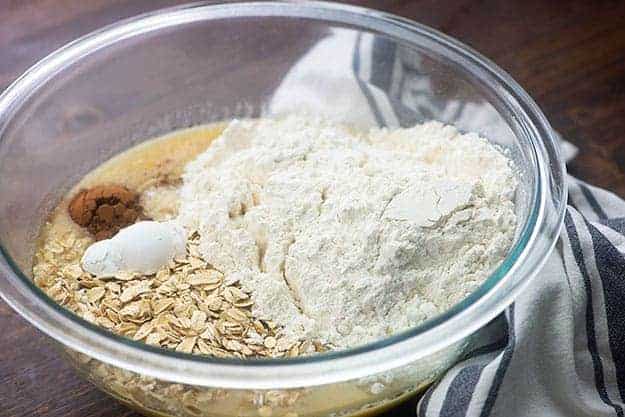 ingredients for blueberry bread in glass bowl