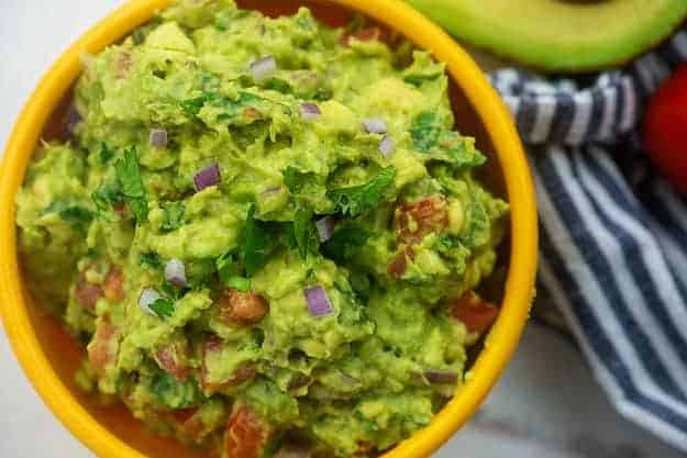 guacamole in yellow bowl