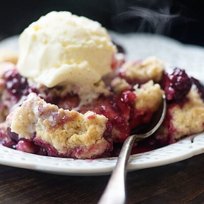 This blackberry cobbler recipe has quickly become our favorite way to make cobbler! The dough on top of the berries is just amazing!