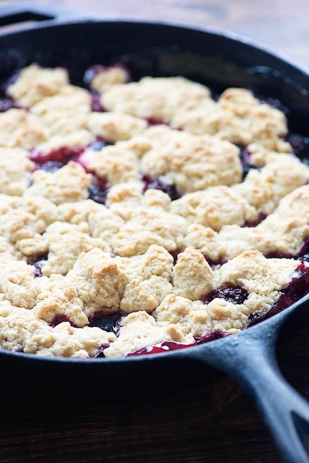 blackberry cobbler in cast iron pan