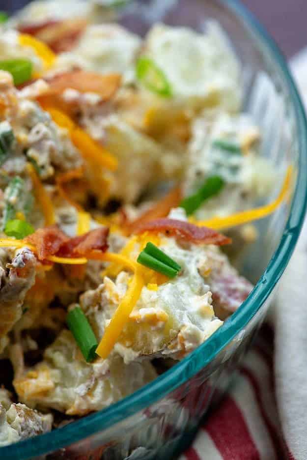 Potato salad in a clear glass bowl
