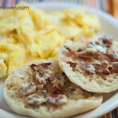 An English muffin topped with bacon butter