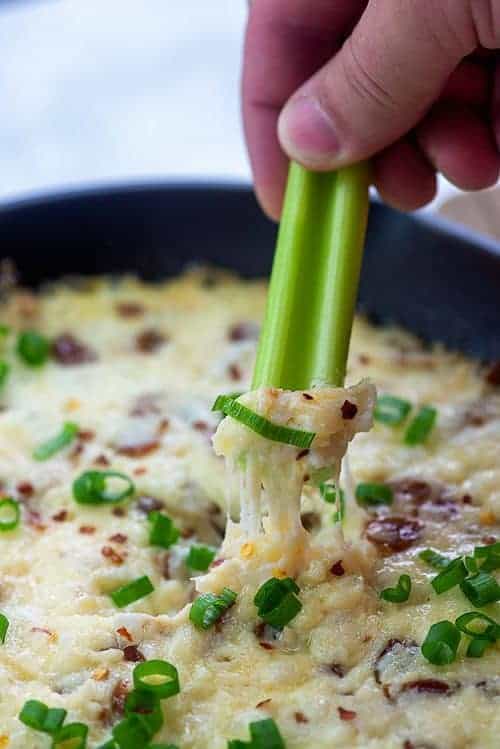 celery dipped in bacon cheese dip