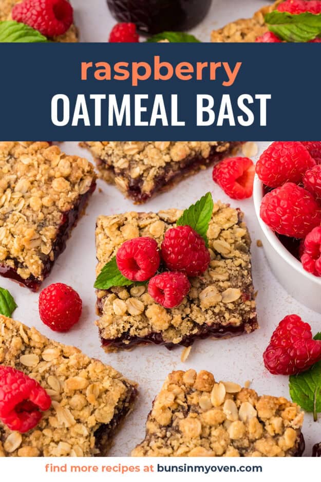 Raspberry oatmeal bars topped with fresh berries.