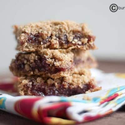 Three stacked raspberry oatmeal  bars