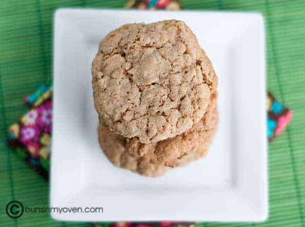 Cookies stacked on top of a small square plate 