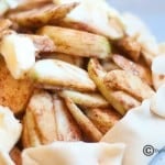 A closeup of apple slices in a pie crust