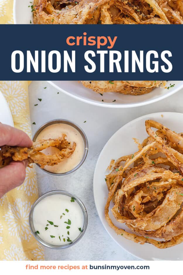 onion string being dipped in ranch