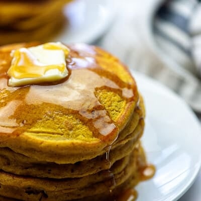 easy pumpkin pancakes on white plate