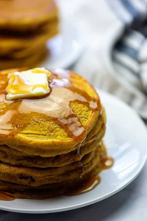 easy pumpkin pancakes on white plate