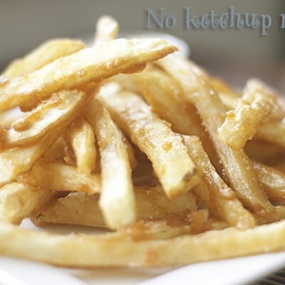 A closeup of battered French fries