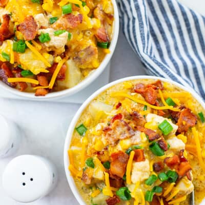 chicken and corn chowder in white bowls.