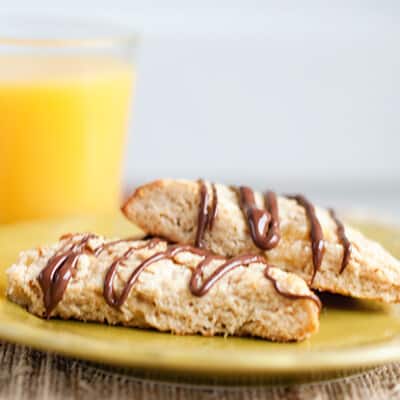 Two Nutella topped scones on a plate