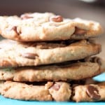 A stack of peanut butter chocolate chip cookies up close