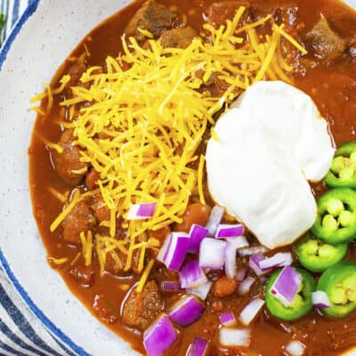 Overhead view of steak chili in bowl.