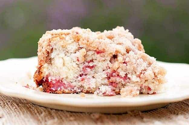 A close up of raspberry coffee cake on a plate