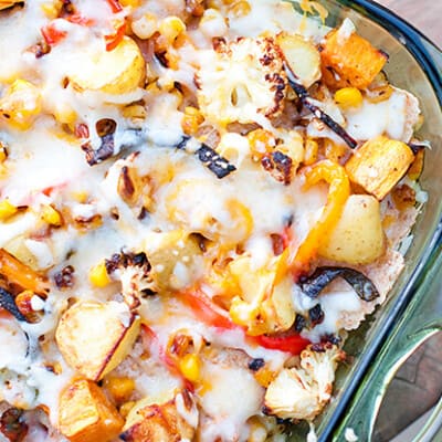 An overhead view of roasted vegetable enchiladas.