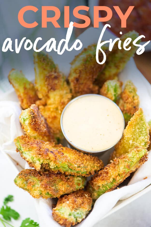 crispy fried avocado in pile next to ranch.