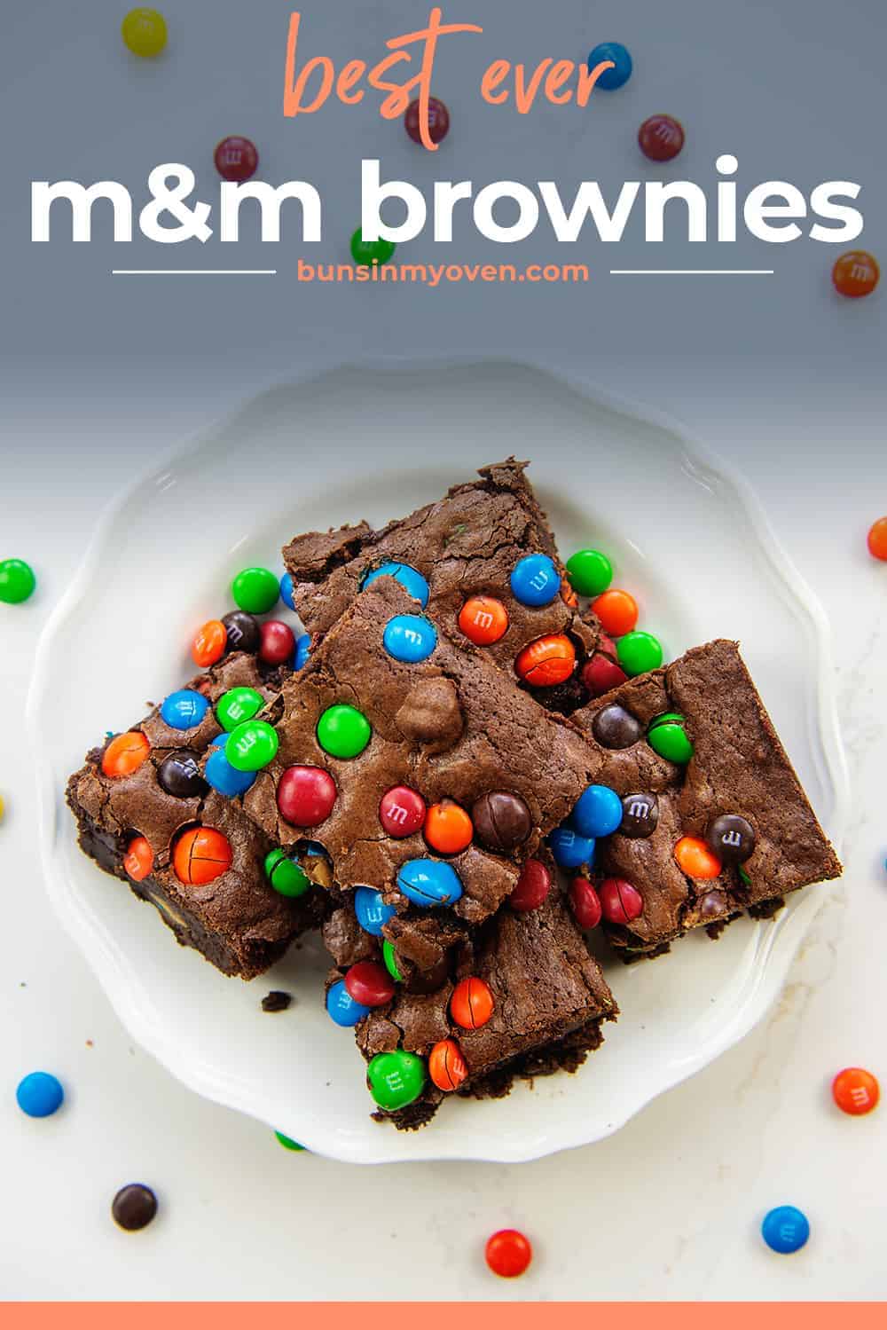 plate of brownies with m&m candies.