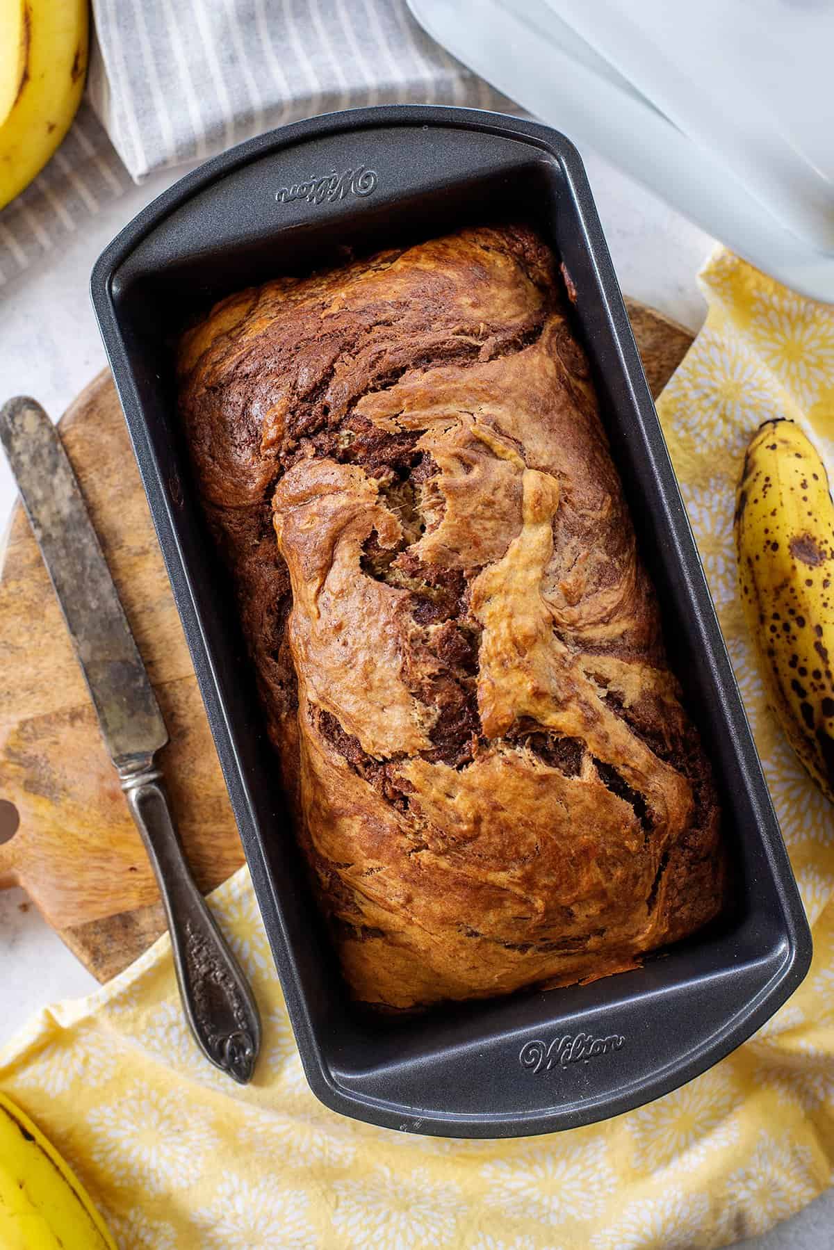 baked Nutella banana bread in loaf pan.