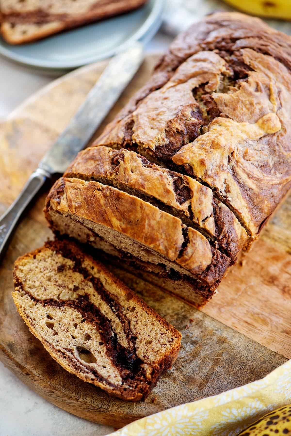 nutella swirled banana bread on cutting board.