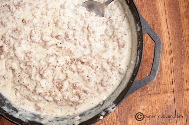 Homemade gravy cooked in an iron skillet.