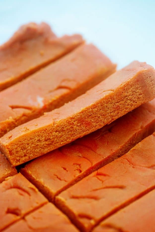 homemade butterfinger filling cut into bars. 