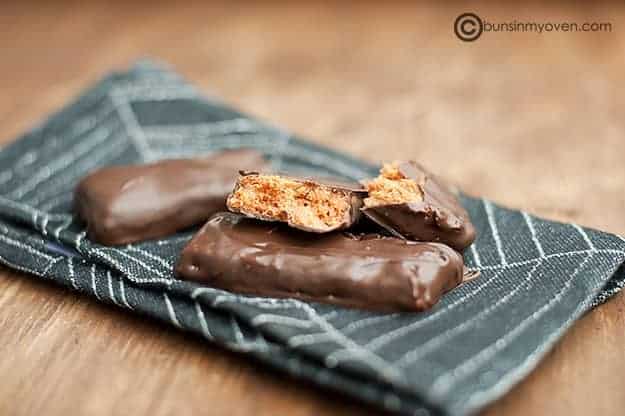 Split homemade Butterfinger candy bars on a place mat.