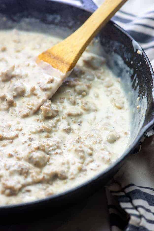 HOMEMADE SAUSAGE GRAVY is always the answer to 'What's for breakfast?' Biscuits and gravy are my husband's favorite breakfast and I love how easy it is to whip this sausage gravy recipe up in no time.