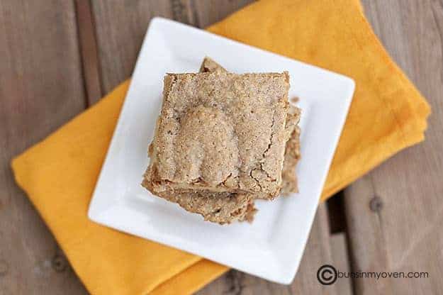 An overhead view of johnny Appleseed bars on a square white plate.