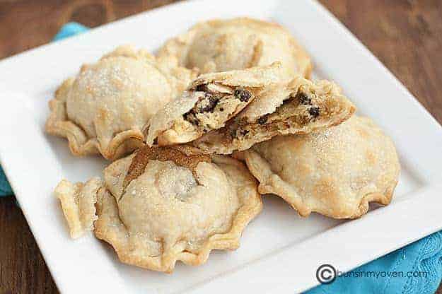 A plate of mini chocolate chip pies.