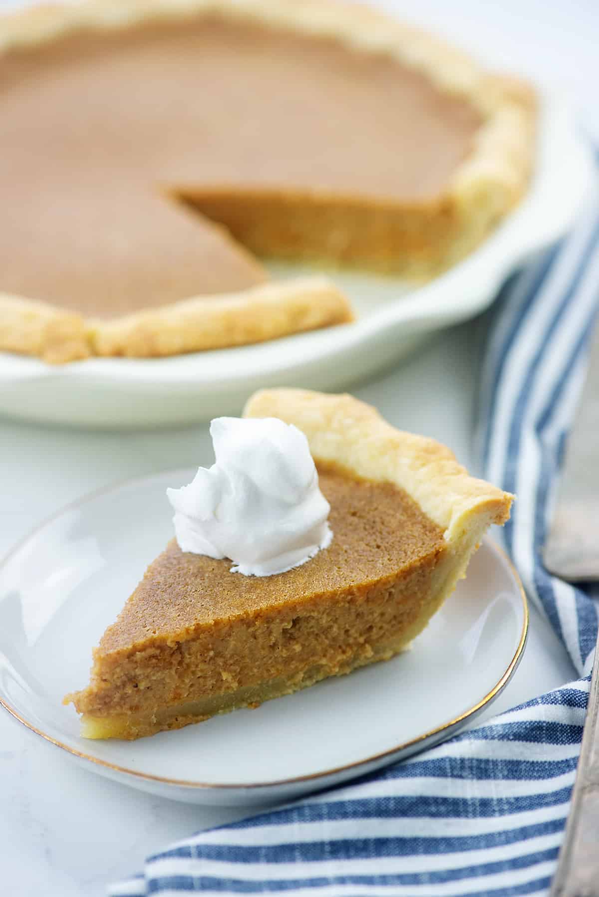 easy sweet potato pie recipe on white plate.