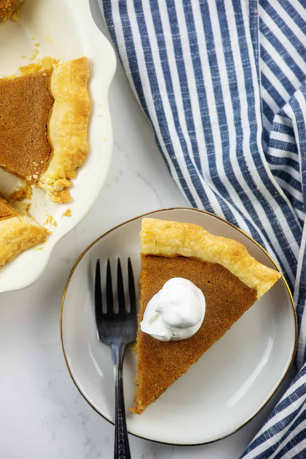 southern sweet potato pie recipe on white plate.