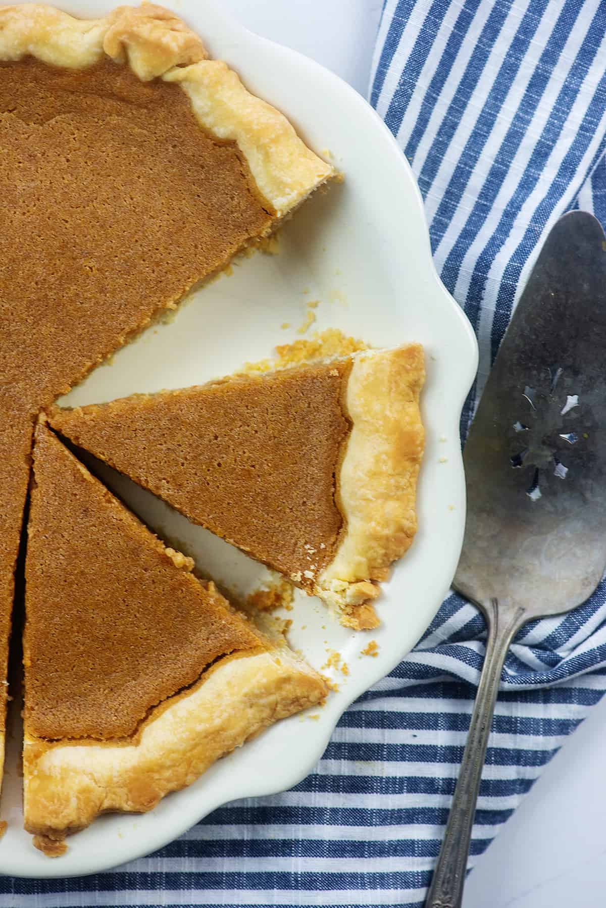 sliced pie in ceramic pie dish.