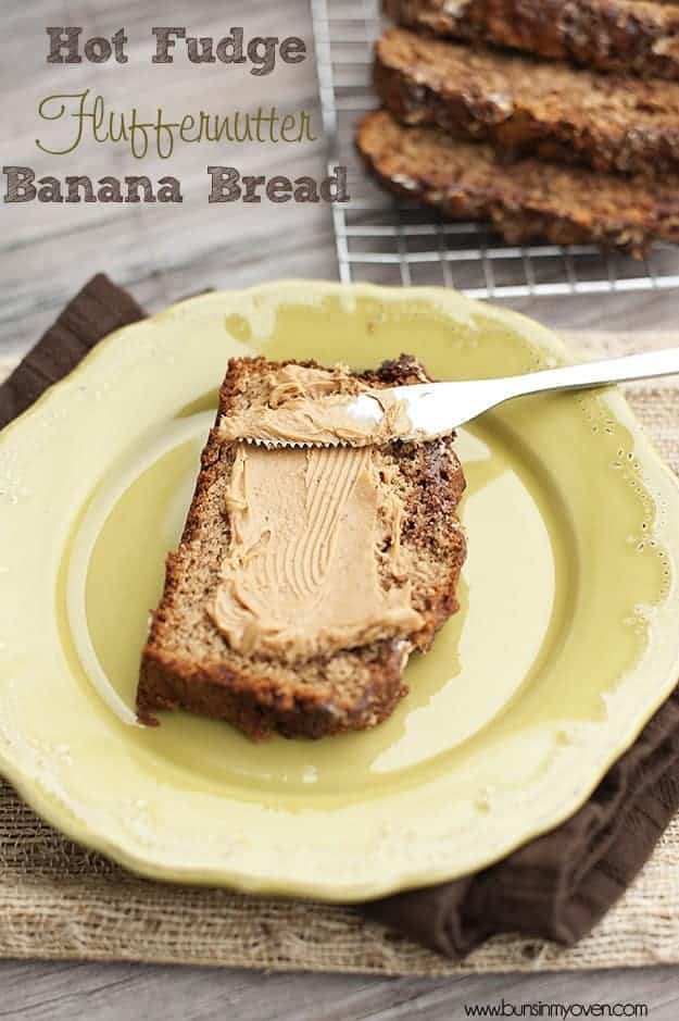 slice of banana bread on yellow plate smeared with peanut butter