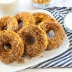 baked donuts on white plate.