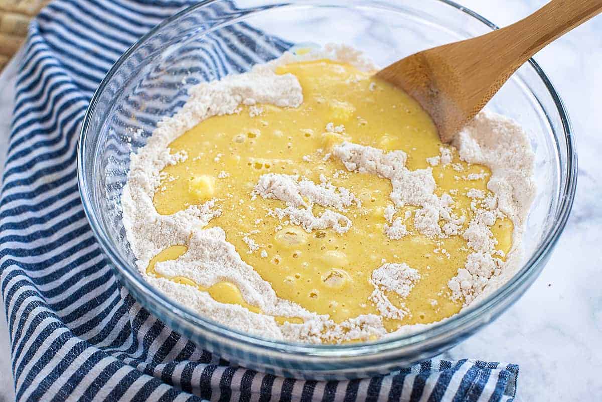 donut batter in glass mixing bowl.