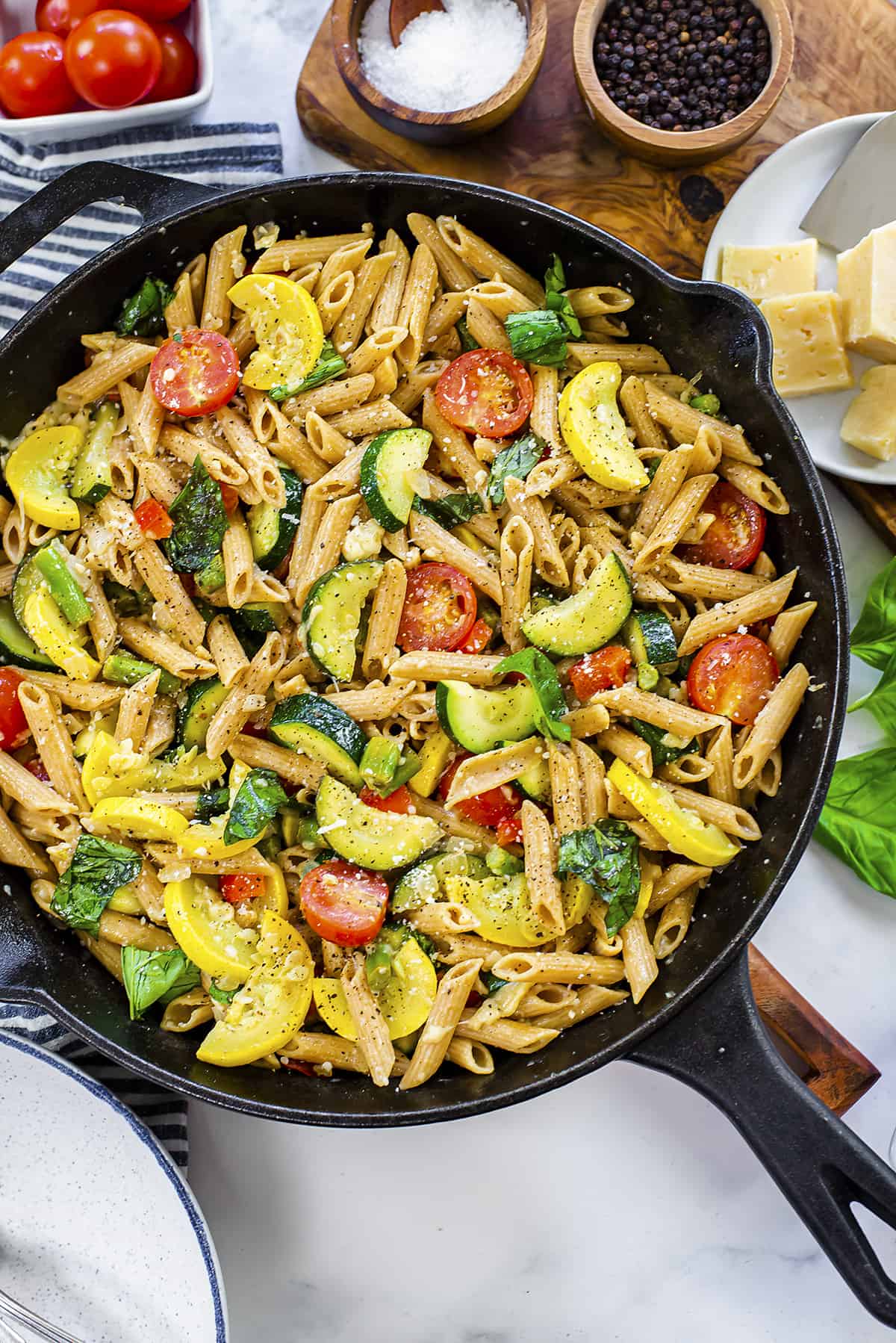 Overhead view of pasta primavera in skillet.