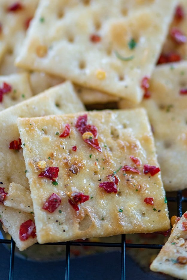 crackers seasoned with ranch and red pepper flakes.