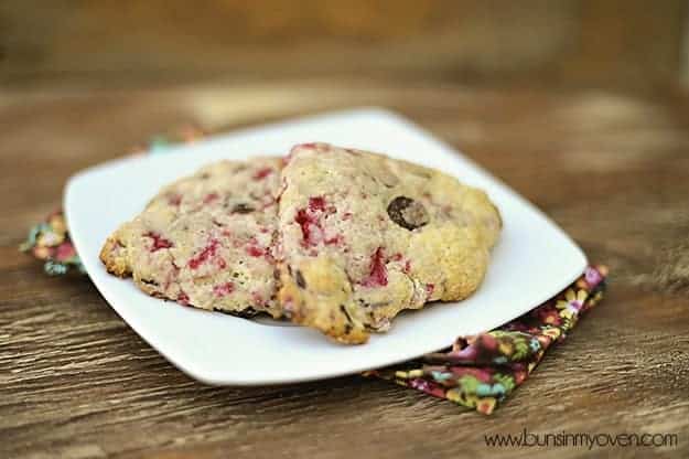 Two chocolate raspberry scones on a square plate 